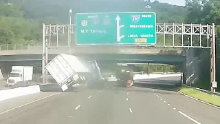 Video shows tractor-trailer overturn in alleged road rage crash