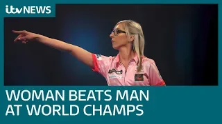 Fallon Sherrock becomes first woman to beat man at World Darts Championship | ITV News