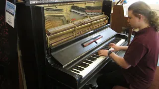 Elliot playing on a beautiful 1880s Steinway upright