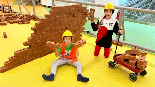 Sofia and Max study children's professions and play in the construction playground