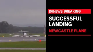 Light plane makes successful emergency landing at Newcastle airport | ABC News