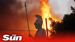 Greece wildfires - Out of control blaze sees residents flee by boat as villages are destroyed