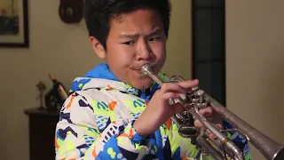 Maurice Mao of China(12 )plays trumpet solo: "Flight of the Bumblebee” from Rimsky-Korsakov