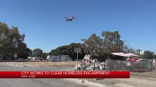 City of San Jose works to clear homeless encampment near airport