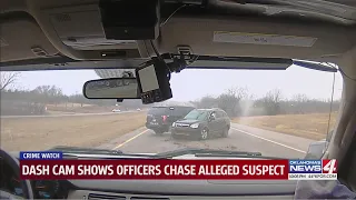 Dashcam shows officer chase alleged suspect