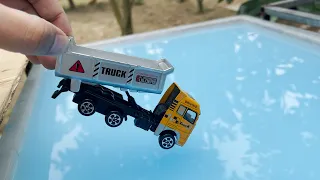 Die Cast Toy Trucks Fall Into Water