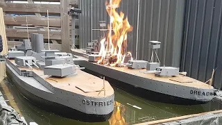 Wooden Model Ship On Fire And Sinking: Battleship Dreadnought Versus Battleship Ostfriesland