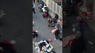 HOMELESS SITUATION ON SKID ROW.  TIGER DRONE TV VIEW. DOWNTOWN LA. FIRST HAND FLIGHT.