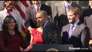 Obama catches fainting pregnant woman during speech