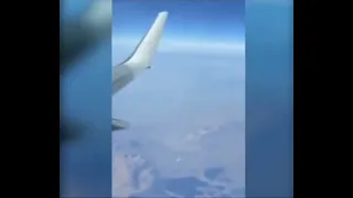 UFO appears beside plane!