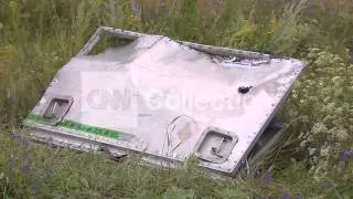 UKRAINE-DAY SCENE OF CRASH SITE- PASSENGER ITEMS