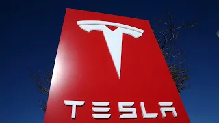 Tesla stock touches record high after Wedbush analyst increases price target