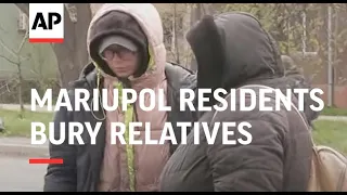 Mariupol residents bury relatives amid ongoing war