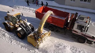 Finland: moving the snow from the sides of the road