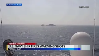 US Navy ship fires warning shots