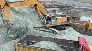 Liebherr 974 Excavator Loading Mercedes And MAN Trucks With Three Passes