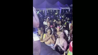 Spice teaches fan "wine and guh dung deh" dance on stage
