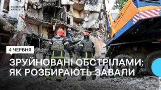 Рятувальники розбирають завали у 9-поверхівці в Салтівському районі Харкова