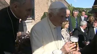 Pope Benedict XVI enjoys a beer for 90th birthday