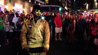 Gold guy dancing on bourbon street