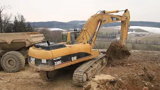 CAT 330C loads Volvo A40D