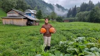 THE WOMAN LIVES ALONE IN THE MOUNTAINS.  Cooking pumpkin porridge in the oven