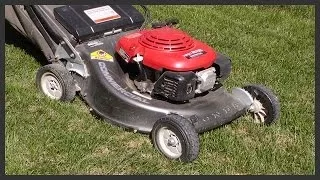 How to change the lawnmower's spark plug