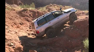 Toyota's and a GMC off-roading in "The Ditch" Kane Creek 4x4 trail, Moab