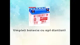 Umpleți bateria cu apă distilată