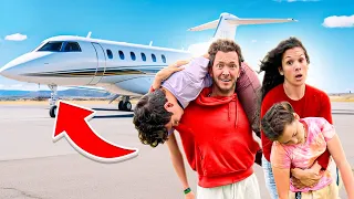 We SNUCK our kids onto the PLANE! *unexpected surprise*