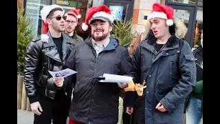 Jack Black & Nick Jonas go carol singing!