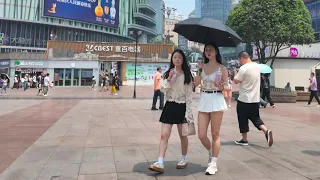 April 28, 2024, Chongqing Guanyin Bridge, summer is here, beautiful women are cool