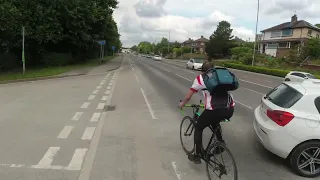 Cyclist insults a car driver and then watch what he goes and does.