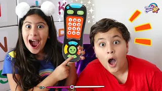 Maria Clara and JP play with magic remote control