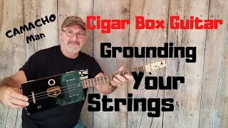 How to build a 3 string Cigar Box Guitar - Grounding your Strings.