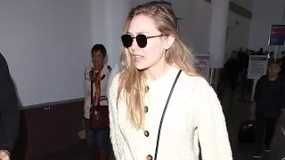 Movie Star Elizabeth Olsen Floats Through LAX