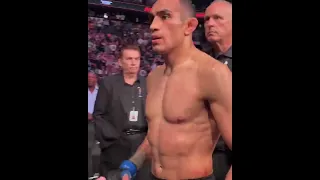 Tony Ferguson is embraced by Chuck Liddell as he leaves the cage at #UFC274