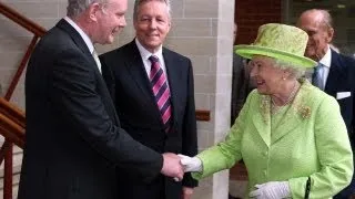 Queen shakes hands with former IRA leader