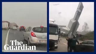Turkey: trucks overturn and buildings collapse as extreme winds hit Istanbul
