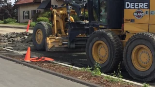 Removing Asphalt for Roadway Grading