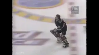Nikolai Khabibulin and Grant Fuhr in a massive Blues   Coyotes fight (1996)