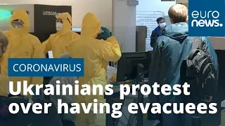 Ukrainians protest over having COVID-19 coronavirus evacuees in their region