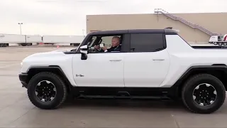 Biden promotes EVs with Hummer test drive