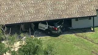 Police and chase suspect slam into houses during chase