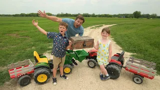 Using tractors to dig up treasure chest | Tractors for kids