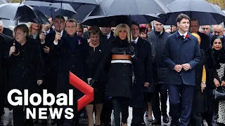 World leaders march down Champs-Élysées in show of unity on Armistice