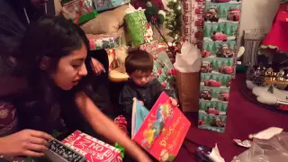 Elijah opening Amanda''s gifts, Christmas 2015