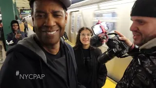 Denzel, Washington greets   fans after filming a scene for the upcoming  movie, high and low