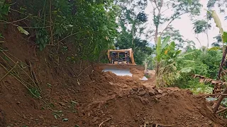 Excellent Work CATERPILLAR BULLDOZER D6R XL cuts hills to lower banana plantation road inclines