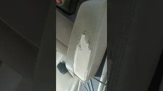 worn and torn arm rest